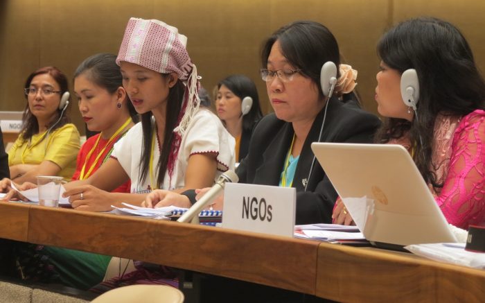 Myanmar's NGO delegation make their joint statement to the CEDAW Committee. Naw Hser Hser is in the pink headdress. Photo: WLB
